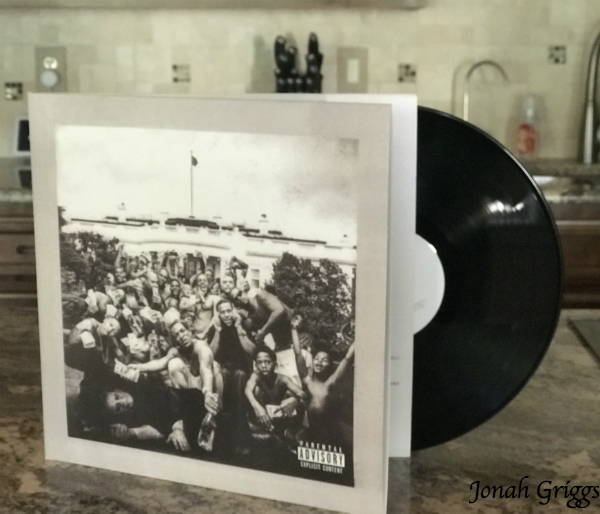 A photo of Kendrick Lamar's "To Pimp a Butterfly" displayed on a countertop.